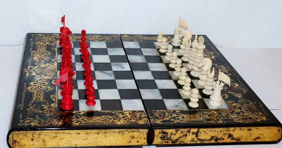 Antique Leuchars Chess Set on chessboard